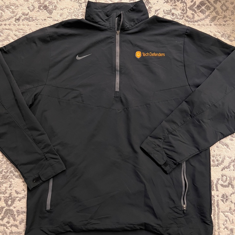 Black Nike Pullover with Orange “Tech Defenders” Logo
